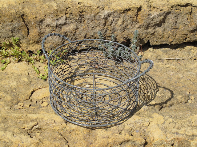Round gray basket available for rent from www.momentarilyyours.com, $2.