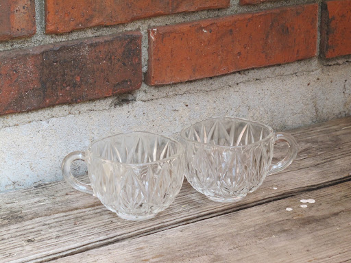 Clear teacups available for rent from www.momentarilyyours.com