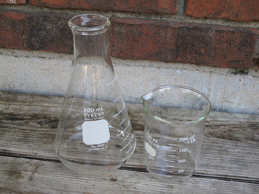 500 mL Erlenmeyer flasks, $2 each, and small 200 mL beaker, $1 each, available for rent from www.momentarilyyours.com, $0.50 each.