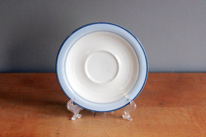 Blue stoneware saucers available for rent from www.momentarilyyours.com, $0.50 each.