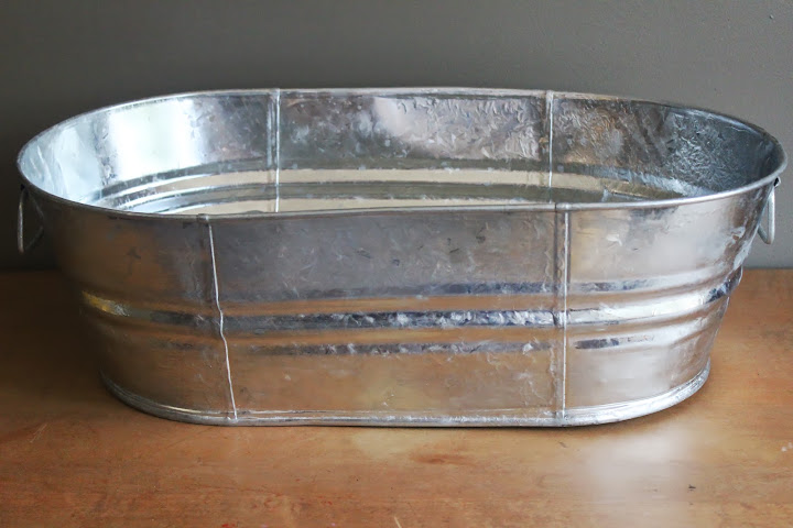 Oval metal tubs available for rent from www.momentarilyyours.com, $6 each.