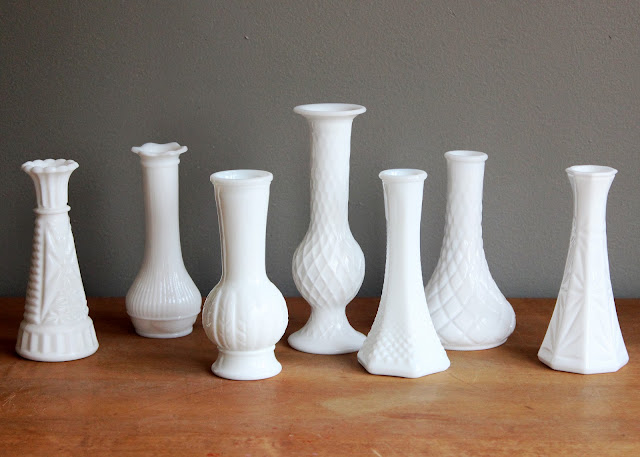 Milk glass bud vases available for rent from www.momentarilyyours.com, $0.75 each.