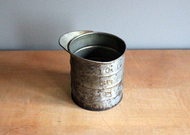 Rusty tin measuring cups available for rent from www.momentarilyyours.com, $1.