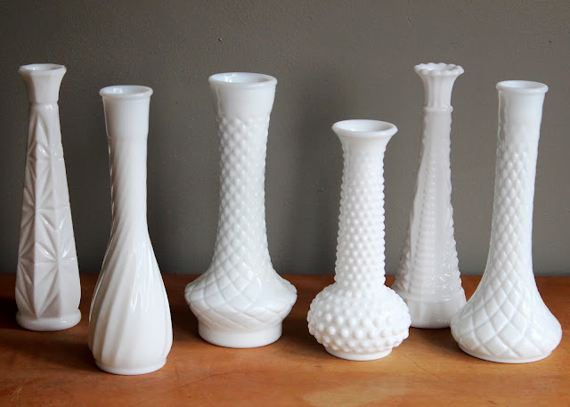 Tall milk glass vases available for rent from www.momentarilyyours.com, $1.00 each.