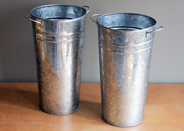 Tall metal pails from the rental inventory of www.momentarilyyours.com