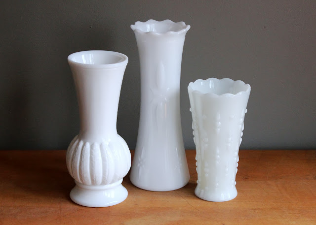 Wide mouth milk glass vases available for rent from www.momentarilyyours.com, $1.50 each.