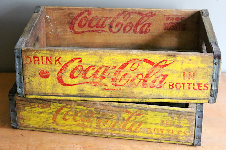 Yellow Coca-Cola crates available for rent from www.momentarilyyours.com, $5 each.