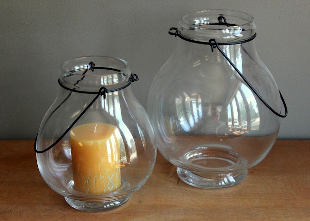 Bulbous glass pillar holders available for rent from www.momentarilyyours.com
