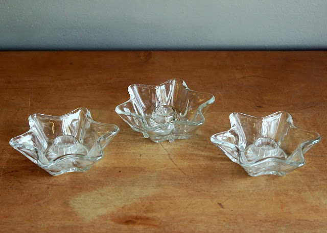 Clear star taper holders available for rent from www.momentarilyyours.com