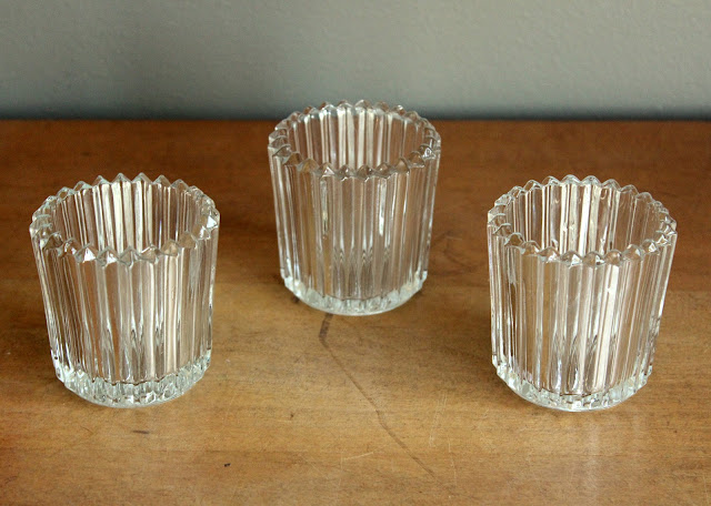 Clear votives with vertical stripes available for rent from www.momentarilyyours.com