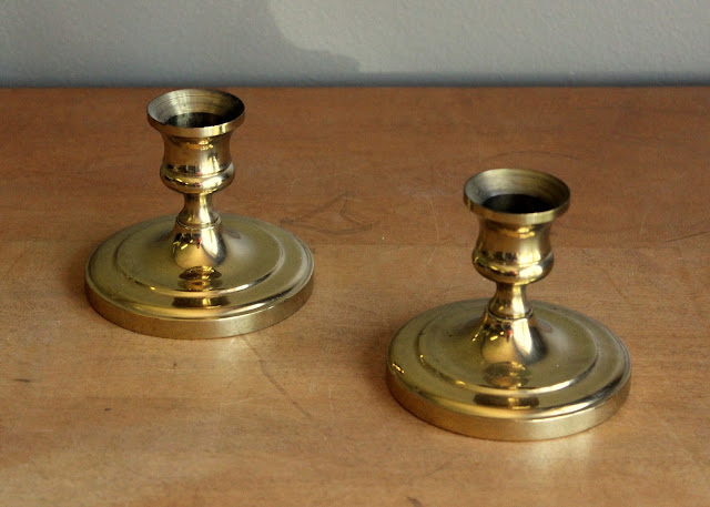 Gold taper holders available for rent from www.momentarilyyours.com