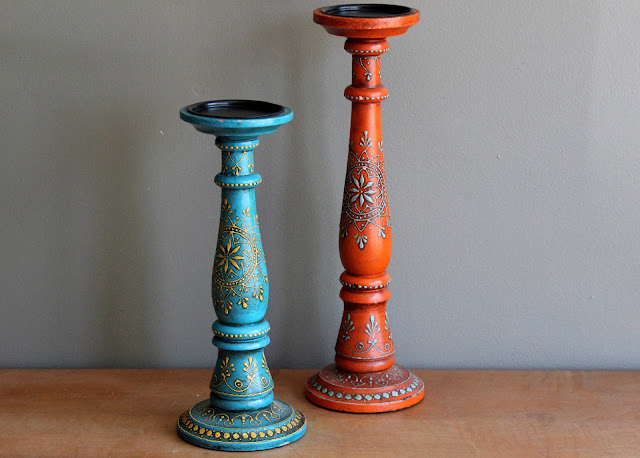 Colorful pillar holders from the rental inventory of www.momentarilyyours.com