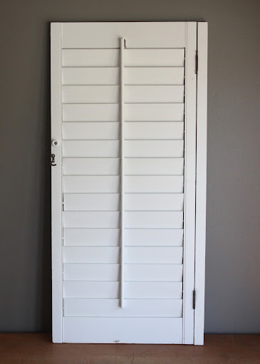 White shutter from the rental inventory of www.momentarilyyours.com