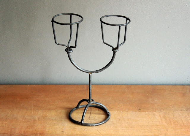 Wire candleabra from the rental inventory of www.momentarilyyours.com, $3.00.