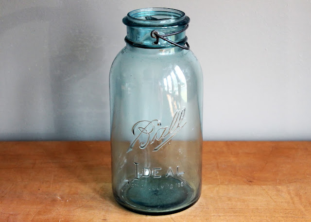 Half gallon blue mason jar with wire closure available for rent from www.momentarilyyours.com, $3.50 each.