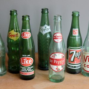 Assorted Green Soda Bottles
