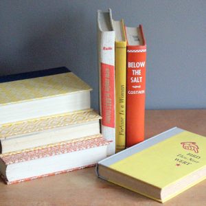 Assorted Orange & Yellow Hardcover Books