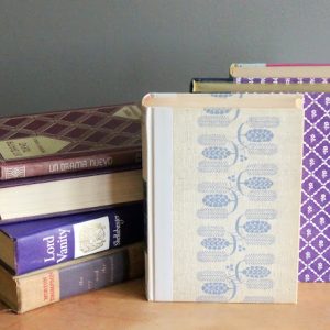 Assorted Purple Hardcover Books